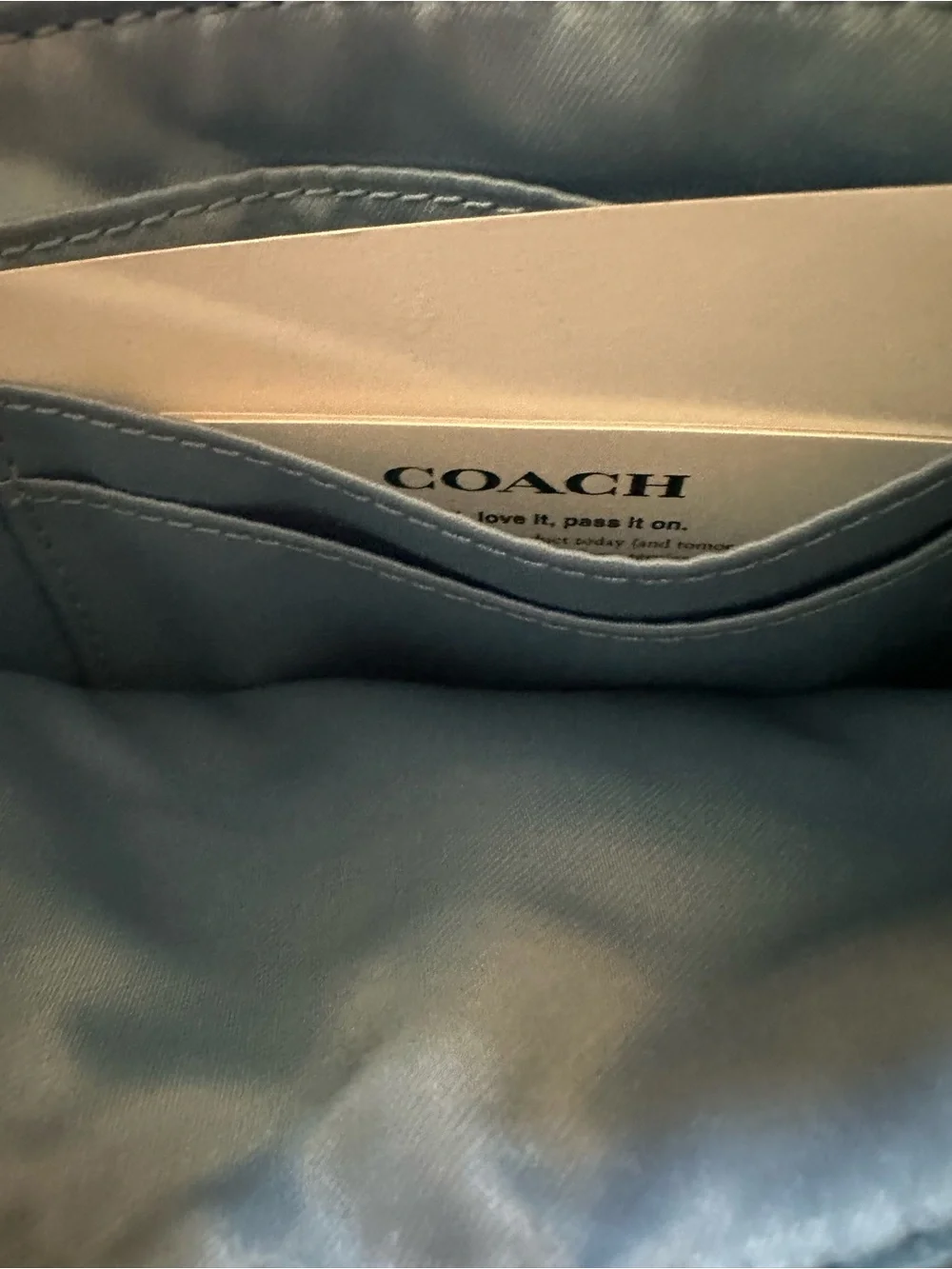COACH Black Pebbled Leather Double Zipper Wristlet, Logo Disc, Ice Blue Lining